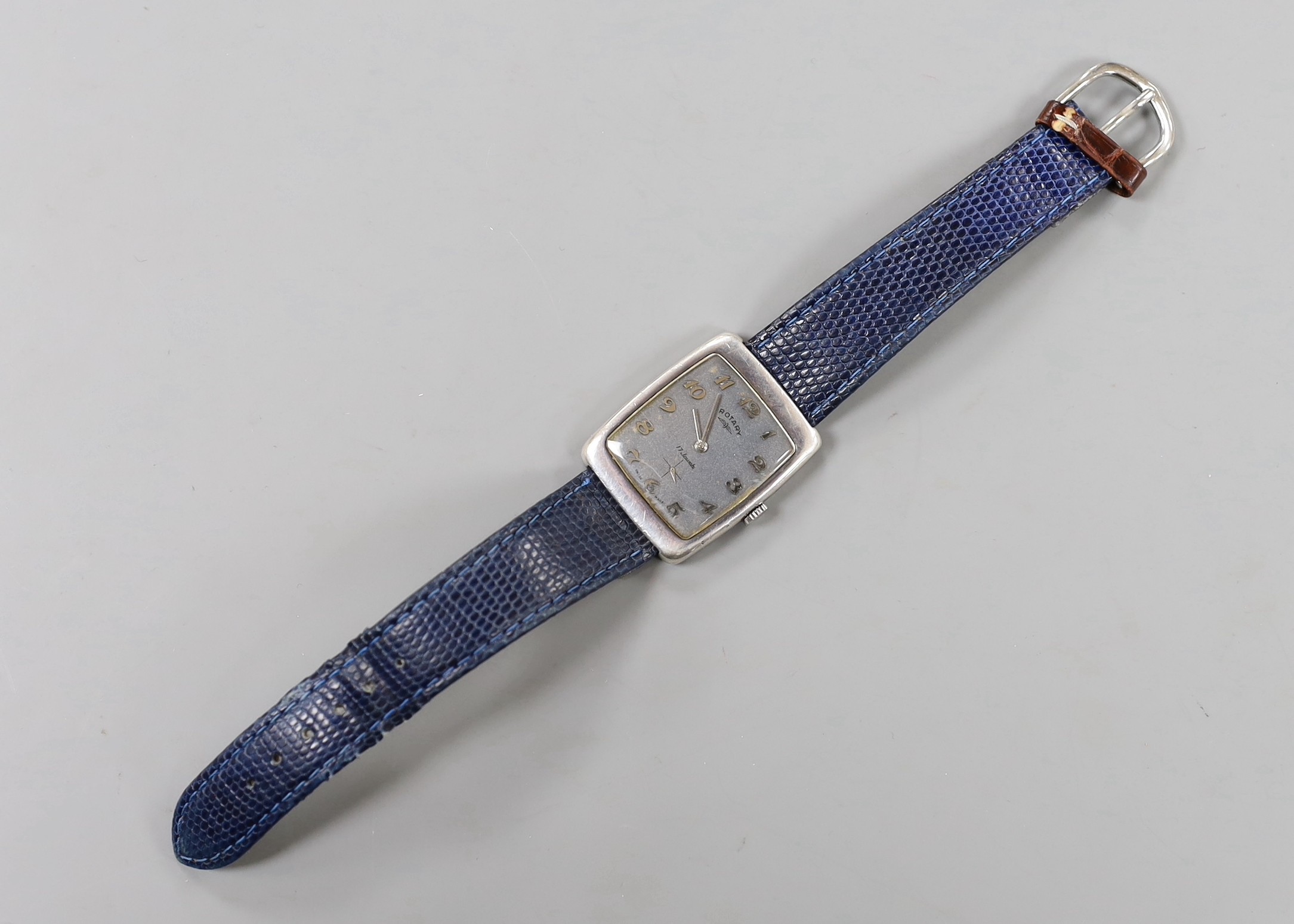 A gentleman's 1970's silver Rotary manual wind wrist watch, with Arabic dial, on associated leather strap, case diameter 30mm, no box or papers.